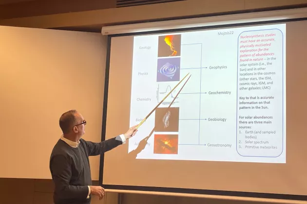 S. Mojzsis giving a talk. Photo