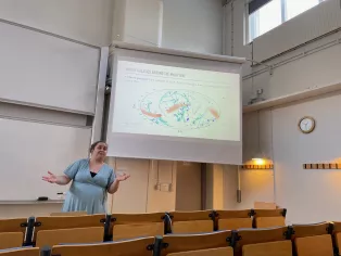 A. Skuladottir giving a talk. Photo.